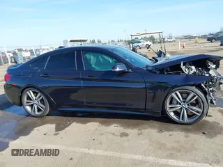 2015 BMW 4 Series 435i with VIN WBA4B1C54FD418309, listed as a IAAI auction lot 42099401 with 119,982 mi miles and . Bid and sale history available at carsss.com. Image 13.