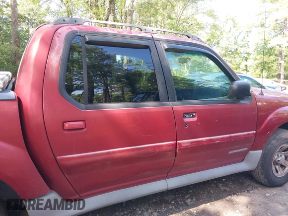 2001 Ford Explorer Sport Trac z VIN 1FMZU67EX1UA94698, wystawiony jako IAAI lot #42764474 z przebiegiem 299 653 mil mil oraz . Historia ofert i sprzedaży dostępna na DreamBid. Obrazek 12.
