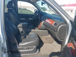 2014 Chevrolet Tahoe LT with VIN 1GNSCBE06ER233105, listed as a IAAI auction lot 41753190 with 161,056 mi miles and . Bid and sale history available at DreamBid. Image 5.