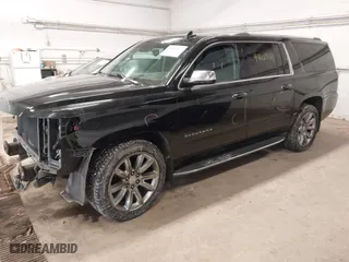 2017 Chevrolet Suburban Premier with VIN 1GNSKJKC3HR260195, listed as a IAAI auction lot 41609363 with 166,447 mi miles. Bid and sale history available at carsss.com. Image 2.