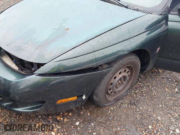 1997 Saturn SC z VIN 1G8ZG1277VZ342397, wystawiony jako IAAI lot #41966570 z przebiegiem 184 054 mil mil oraz . Historia ofert i sprzedaży dostępna na DreamBid. Obrazek 13.