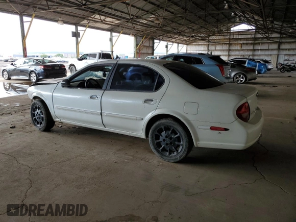 2001 Nissan Maxima GXE with VIN JN1CA31D41T809212, listed as a Copart auction lot 57845405 with 244,502 mi miles and Salvage title. Bid and sale history available at DreamBid. Image 2.