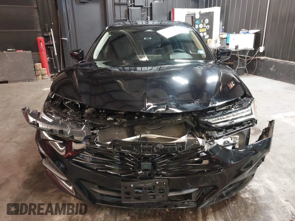 2024 Acura TLX Technology with VIN 19UUB5F41RA000648, listed as a IAAI auction lot 41118831 with 6,916 mi miles and . Bid and sale history available at DreamBid. Image 6.