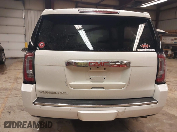 2015 GMC Yukon XL Denali with VIN 1GKS2JKJ1FR635901, listed as a IAAI auction lot 41805739 with 120,998 mi miles and . Bid and sale history available at carsss.com. Image 17.