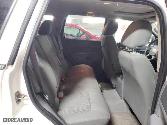2005 Jeep Grand Cherokee Laredo with VIN 1J4HR48N75C679152, listed as a Copart auction lot 46933765 with 221,299 mi miles and Salvage Title. Bid and sale history available at carsss.com. Image 10.