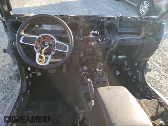 2021 Jeep Gladiator Rubicon z VIN 1C6JJTBMXML503128, wystawiony jako Copart lot #42813725 z przebiegiem Nie podano mil oraz Szkoda całkowita • Salvage title. Historia ofert i sprzedaży dostępna na DreamBid. Obrazek 8.