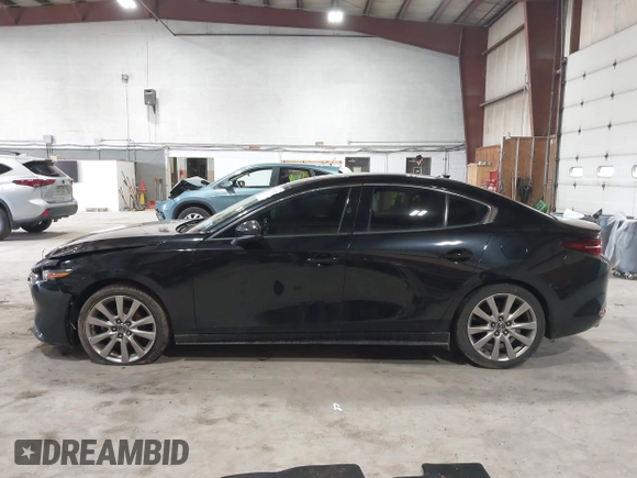 2020 Mazda 3 Premium with VIN 3MZBPBEM4LM123018, listed as a IAAI auction lot 41967652 with 84,642 mi miles and . Bid and sale history available at DreamBid. Image 14.