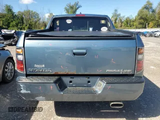 2006 Honda Ridgeline RTL with VIN 2HJYK16556H545357, listed as a Copart auction lot 70656694 with 153,668 mi miles and Salvage Title. Bid and sale history available at carsss.com. Image 6.