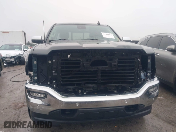 2017 GMC Sierra 1500 SLT z VIN 1GTV2NEC5HZ180843, wystawiony jako IAAI lot #41509410 z przebiegiem 89 943 mil mil oraz . Historia ofert i sprzedaży dostępna na DreamBid. Obrazek 13.