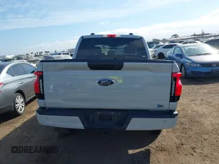 2023 Ford F-150 Lightning Pro z VIN 1FTVW1EL6PWG01336, wystawiony jako IAAI lot #41692903 z przebiegiem 39 085 mil mil oraz . Historia ofert i sprzedaży dostępna na DreamBid. Obrazek 16.