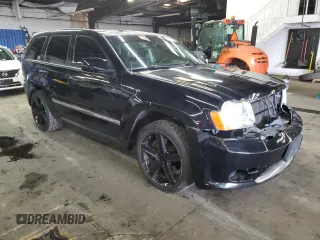 2008 Jeep Grand Cherokee SRT-8 with VIN 1J8HR78378C168740, listed as a Copart auction lot 87053654 with 139,760 mi miles and Salvage Title. Bid and sale history available at carsss.com. Image 4.