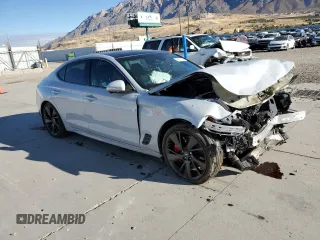2022 Genesis G70 3.3T with VIN KMTG54TE0NU084403, listed as a Copart auction lot 79113114 with 19,173 mi miles and Salvage Title. Bid and sale history available at DreamBid. Image 4.