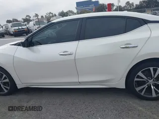 2016 Nissan Maxima SL with VIN 1N4AA6AP3GC448957, listed as a IAAI auction lot 41734717 with 128,687 mi miles and . Bid and sale history available at DreamBid. Image 14.