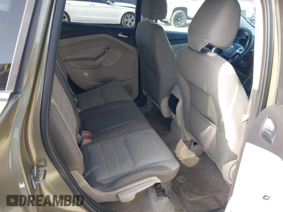 2013 Ford Escape SE z VIN 1FMCU0GX2DUD94471, wystawiony jako IAAI lot #42655476 z przebiegiem 146 578 mil mil oraz . Historia ofert i sprzedaży dostępna na DreamBid. Obrazek 8.