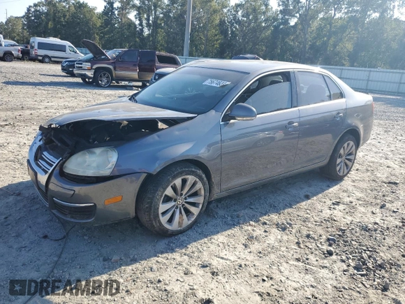 2006 Volkswagen Jetta z VIN 3VWDG71K26M673879, wystawiony jako Copart lot #75674634 z przebiegiem 93 689 mil mil oraz Szkoda całkowita • Salvage title. Historia ofert i sprzedaży dostępna na DreamBid. Obrazek 1.