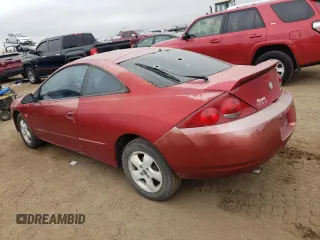 1999 Mercury Cougar z VIN 1ZWFT61L0X5760822, wystawiony jako Copart lot #66851824 z przebiegiem 128 109 mil mil oraz Tytuł czysty. Historia ofert i sprzedaży dostępna na DreamBid. Obrazek 2.