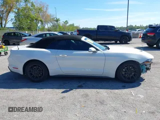 2019 Ford Mustang EcoBoost z VIN 1FATP8UHXK5205196, wystawiony jako IAAI lot #41688651 z przebiegiem 75 642 mil mil oraz . Historia ofert i sprzedaży dostępna na DreamBid. Obrazek 13.