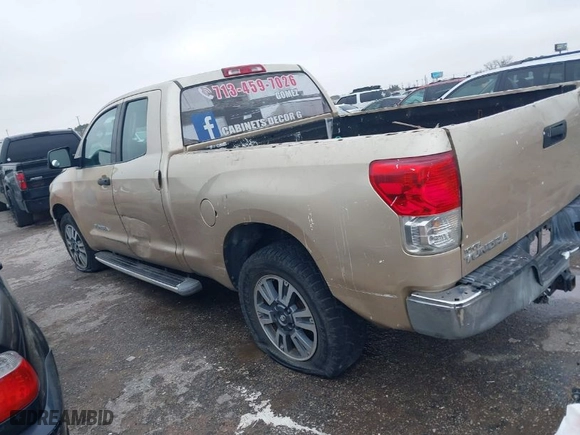 2010 Toyota Tundra 2WD Truck with VIN 5TFRM5F14AX012699, listed as a IAAI auction lot 41436869 with 1 mi miles. Bid and sale history available at carsss.com. Image 3.