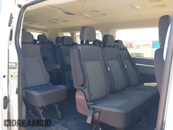 2023 Ford Transit Passenger XL with VIN 1FBAX2Y89PKA45043, listed as a IAAI auction lot 39253709 with 54,625 mi miles and . Bid and sale history available at DreamBid. Image 8.