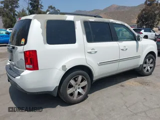 2013 Honda Pilot Touring with VIN 5FNYF3H93DB017954, listed as a IAAI auction lot 42185556 with 174,929 mi miles and . Bid and sale history available at carsss.com. Image 4.