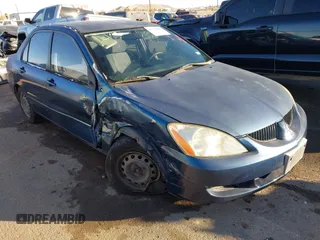 2005 Mitsubishi Lancer ES with VIN JA3AJ26E65U014838, listed as a IAAI auction lot 41310586 with 127,487 mi miles. Bid and sale history available at carsss.com. Image 1.