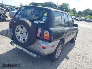 1998 Toyota RAV4 with VIN JT3GP10V7W7037711, listed as a IAAI auction lot 42081313 with 233,554 mi miles. Bid and sale history available at carsss.com. Image 4.