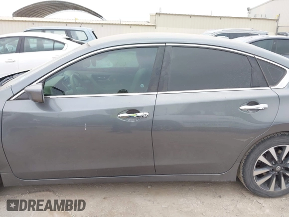2017 Nissan Altima SV with VIN 1N4AL3AP1HC190366, listed as a IAAI auction lot 41955524 with 163,824 mi miles and . Bid and sale history available at DreamBid. Image 14.