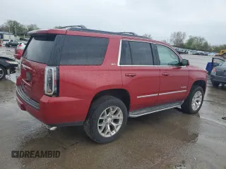 2015 GMC Yukon SLT z VIN 1GKS2BKC6FR154565, wystawiony jako Copart lot #50881225 z przebiegiem 160 669 mil mil oraz Szkoda całkowita • Salvage title. Historia ofert i sprzedaży dostępna na DreamBid. Obrazek 3.