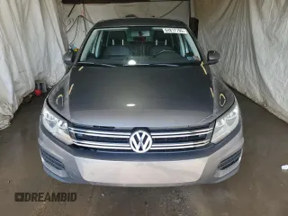 2014 Volkswagen Tiguan SEL with VIN WVGBV3AX2EW541476, listed as a Copart auction lot 64817795 with 158,032 mi miles and Salvage title. Bid and sale history available at DreamBid. Image 5.