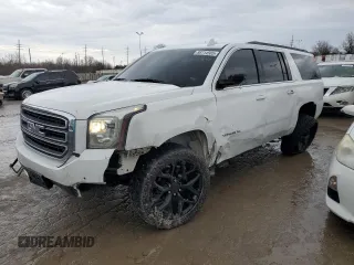 2019 GMC Yukon XL SLT with VIN 1GKS2GKC1KR163598, listed as a Copart auction lot 88714505 with 142,411 mi miles and Salvage Title. Bid and sale history available at carsss.com. Image 1.