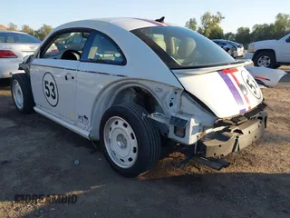 2017 Volkswagen Beetle 1.8T SE with VIN 3VWJ17AT9HM624498, listed as a IAAI auction lot 41662813 with 49,627 mi miles. Bid and sale history available at carsss.com. Image 3.