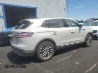 2019 Lincoln Nautilus Reserve z VIN 2LMPJ6LP8KBL14746, wystawiony jako Copart lot #60175275 z przebiegiem 96 405 mil mil oraz Szkoda całkowita • Salvage title. Historia ofert i sprzedaży dostępna na DreamBid. Obrazek 3.