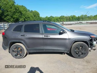 2018 Jeep Cherokee Latitude with VIN 1C4PJMCBXJD597667, listed as a IAAI auction lot 42486786 with 149,081 mi miles and . Bid and sale history available at DreamBid. Image 13.