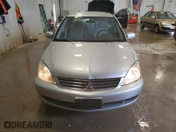 2006 Mitsubishi Lancer ES z VIN JA3AJ26E36U014104, wystawiony jako Copart lot #59814245 z przebiegiem 144 780 mil mil oraz Nie do naprawy • Non repairable. Historia ofert i sprzedaży dostępna na DreamBid. Obrazek 5.