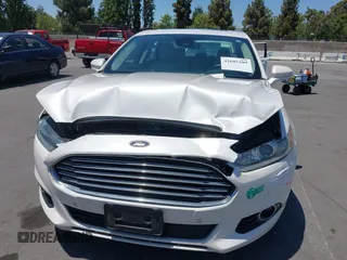 2016 Ford Fusion Titanium z VIN 3FA6P0SU1GR116118, wystawiony jako IAAI lot #42685489 z przebiegiem 138 690 mil mil oraz . Historia ofert i sprzedaży dostępna na DreamBid. Obrazek 12.