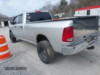 2013 Ram 2500 Tradesman with VIN 3C6UR5HL4DG531407, listed as a IAAI auction lot 41630613 with 299,984 mi miles. Bid and sale history available at carsss.com. Image 3.