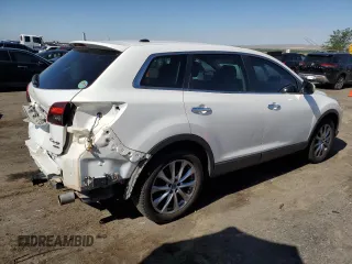 2014 Mazda CX-9 Grand Touring with VIN JM3TB3DA5E0431539, listed as a Copart auction lot 62418005 with 139,686 mi miles and Salvage title. Bid and sale history available at DreamBid. Image 3.