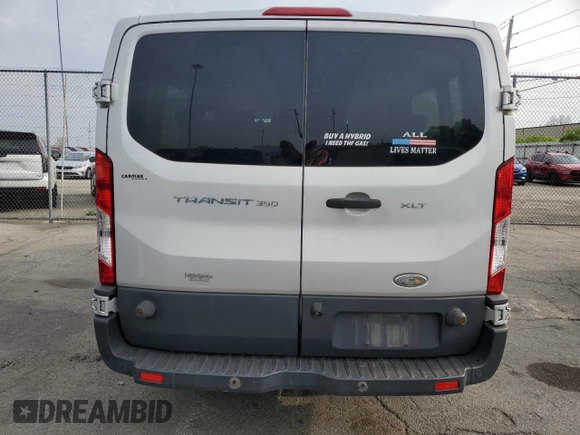 2015 Ford Transit XL with VIN 1FBZX2ZM7FKA38833, listed as a Copart auction lot 55867315 with 133,711 mi miles and Salvage Title. Bid and sale history available at DreamBid. Image 6.