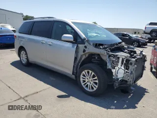 2015 Toyota Sienna XLE with VIN 5TDYK3DC4FS607026, listed as a Copart auction lot 60423605 with 132,327 mi miles and Clean title. Bid and sale history available at DreamBid. Image 4.