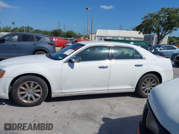 2014 Chrysler 300 with VIN 2C3CCAET6EH173381, listed as a IAAI auction lot 42158270 with 124,551 mi miles. Bid and sale history available at carsss.com. Image 14.