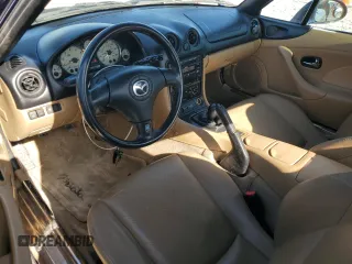 2002 Mazda MX-5 Miata Cloth z VIN JM1NB353720231873, wystawiony jako Copart lot #52398015 z przebiegiem 90 077 mil mil oraz Szkoda całkowita • Salvage title. Historia ofert i sprzedaży dostępna na DreamBid. Obrazek 8.