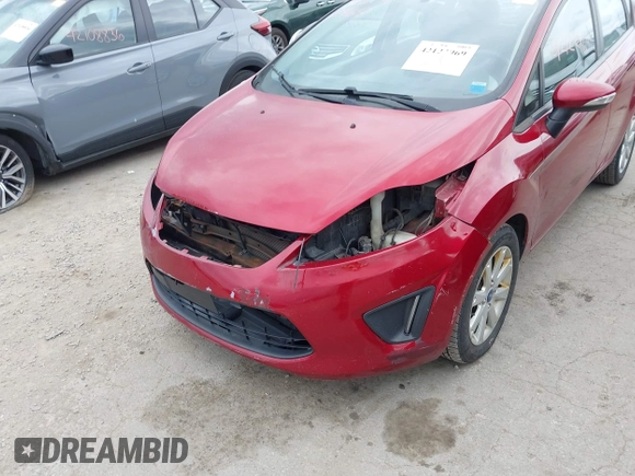2013 Ford Fiesta SE with VIN 3FADP4EJXDM152463, listed as a IAAI auction lot 42122969 with 66,952 mi miles and . Bid and sale history available at DreamBid. Image 6.