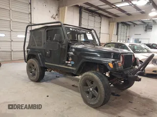 1999 Jeep Wrangler Sahara with VIN 1J4FY49S4XP432567, listed as a IAAI auction lot 41562455 with Not provided miles and . Bid and sale history available at DreamBid. Image 1.