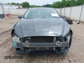 2016 Ford Fusion SE z VIN 3FA6P0H77GR367727, wystawiony jako IAAI lot #42274323 z przebiegiem 309 852 mil mil oraz . Historia ofert i sprzedaży dostępna na DreamBid. Obrazek 13.