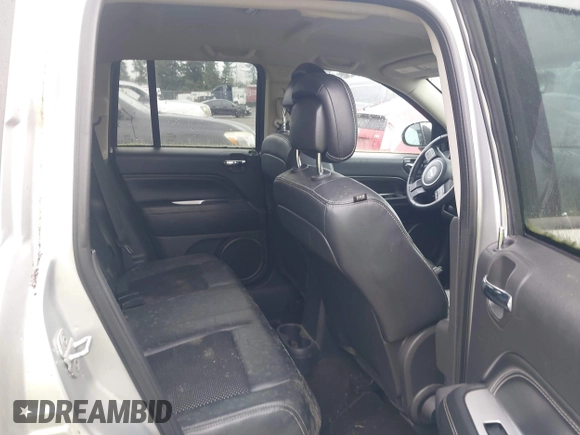 2014 Jeep Compass Latitude with VIN 1C4NJCEAXED522723, listed as a IAAI auction lot 41907230 with 98,252 mi miles and . Bid and sale history available at carsss.com. Image 8.