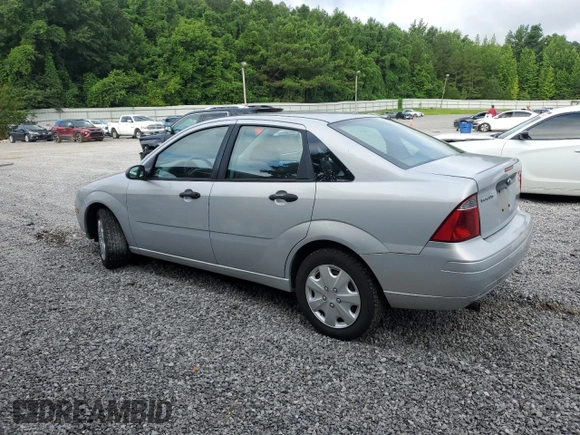 2005 Ford Focus S with VIN 1FAFP34N55W115653, listed as a Copart auction lot 63043315 with 110,593 mi miles and Salvage title. Bid and sale history available at DreamBid. Image 2.