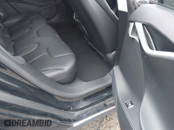 2014 Tesla Model S 60 with VIN 5YJSA1H1XEFP36008, listed as a IAAI auction lot 41287240 with 48,171 mi miles and . Bid and sale history available at DreamBid. Image 8.