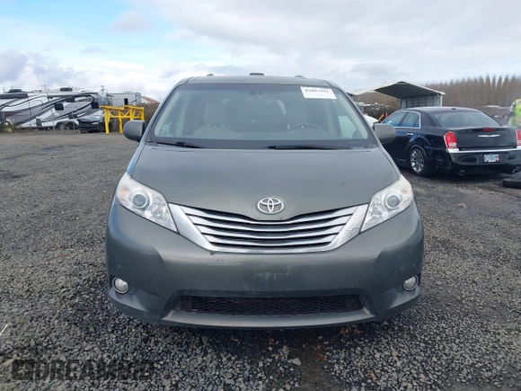 2011 Toyota Sienna XLE with VIN 5TDDK3DCXBS003666, listed as a IAAI auction lot 41807992 with 156,699 mi miles. Bid and sale history available at carsss.com. Image 12.
