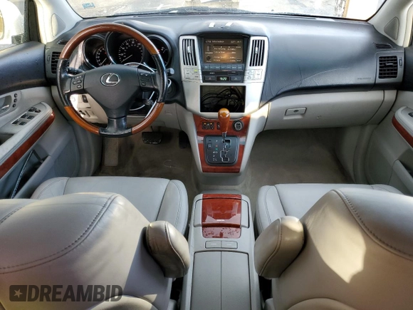 2006 Lexus RX 330 with VIN JTJGA31UX60060839, listed as a Copart auction lot 79948144 with 168,640 mi miles and Salvage Title. Bid and sale history available at DreamBid. Image 8.