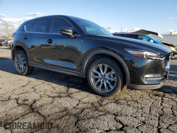 2020 Mazda CX-5 Grand Touring with VIN JM3KFADM0L0786565, listed as a Copart auction lot 48430915 with 60,390 mi miles and Salvage Title. Bid and sale history available at carsss.com. Image 4.